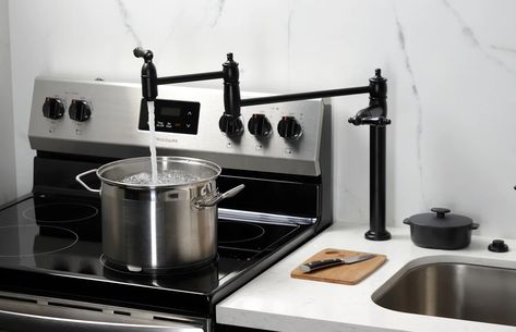 Struggling to fill heavy pots in your kitchen sink? There's a better way! A pot filler faucet is a game-changer, mounted near your stove to extend for easy filling of any pot size. Get yours today at AMAStoneWorks.com #kitchenupgrade #potfillerfaucet #kitchenlife #makecookingfun #musthaveforcooks Over Sink, Pot Filler Faucet, Pot Filler, Kitchen Pot, Kitchen Upgrades, Water Faucet, Game Changer, Kitchen Sink, Stove