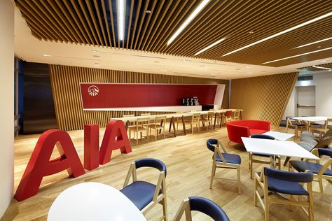 AIA Korea HQ, Seoul, Korea. Interiordesignproject by the Steven Leach group. The new design of Steven Leach Group for the AIA Insurance office in Seoul reflects their vision of leadership under a modern corporate brand. The use of strong diagonal lines throughout the space, along with a rich timber finish, a neutral color scheme, accented with their corporate colors, give the space a strong character. Follow the link for more photos and info about the project and Steven Leach Group. Corporate Colors, Insurance Office, Corporate Image, Diagonal Lines, Office Tower, Diagonal Line, Strong Character, Neutral Color Scheme, Architecture Interiors