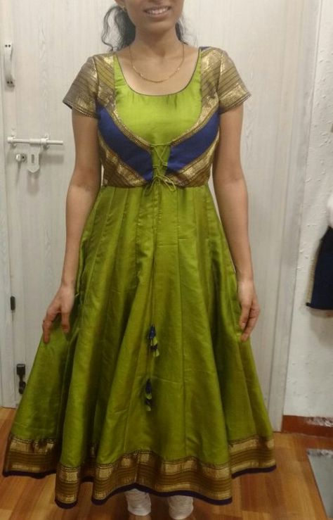 Sai Mitra Fashion Boutique - An elegant  contemporary wonder.  Fusion of Anarkali with overcoat. Contact:0422-4508000 #Green #cotton #silk #creative #pattern #contrast #boutiqueincoimbatore Anarkali With Overcoat, Creative Pattern, Kurta Neck Design, Handwork Embroidery Design, Saree Dress, Ethnic Fashion, Green Cotton, Girl Dresses