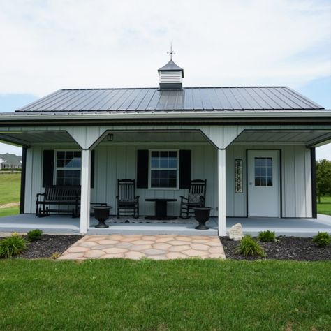 This backyard pole shed measures 24' x 30' but with a lean-to porch and cupola it makes a stunning addition to a backyard. The building is used for equipment storage but could also be insulated to make a beautiful she-shed or man cave.

As with any backyard project, it is the details the make the difference. The black trim on the white steel makes the entire project stand out. The gable windows offers a touch of class. And the landscaping around the entire project is wonderful. She Shed With Porch, Pole Shed Garage, Pole Barn Lean To, Pole Barns With Lean To, Pole Barn Pool House Backyard, Storage Barn With Lean To, Pole Shed, Swimming Pools Backyard Inground, Shop Houses