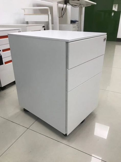 The main material of white mobile pedestal for office is actually cold-rolled steel plate, with common thicknesses of 0.5, 0.6, 0.7, 0.8mm. The thicker the steel plate, the better it feels and the more durable it is. Of course, this is only one aspect. Secondly, it depends on the quality of the surface coating, and then the production process, whether the cabinet of mobile pedestal is upright and firm, whether the design is reasonable, whether the quality of the door lock is good, etc. Mobile Pedestal, Steel Plate, Door Lock, Production Process, The Door, Filing Cabinet, Office Furniture, Beautiful Design, Furniture