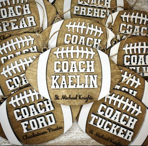 Wooden football ornament, personalized with your coach or players name and number.  Football details and name are cut out of wood for a raised effect.  You can choose to add the name of the school or team and it will be laser engraved into the football.  Jute string is attached for easy hanging. Gift Ideas For Football Coaches, Coaches Gift Ideas Football, Football Coaches Gifts, Gifts For Football Coaches, Football End Of Season Gifts For Players, End Of Season Coach Gifts Football, Laser Engraving Football, Football Team Gifts, Coach Appreciation Gifts