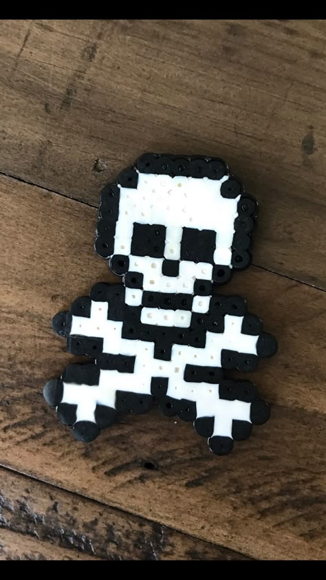 Skull and cross bones perler beads Creepy Perler Beads, Perler Bead Patterns Emo, Skeleton Perler Beads, Skull Perler Bead Patterns, Black And White Perler Bead Patterns, Perler Bead Skull, Scene Perler Beads, Skull Perler, Hama Beads Halloween