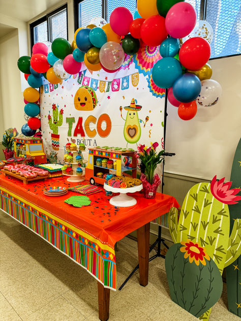 Fiesta themed baby shower with green, yellow, orange, pink, and blue decorations. Let’s Taco Bout A Baby, Mexican Baby Shower Ideas, Taco About A Baby Shower Decorations, Taco Themed Baby Shower Ideas, Taco Baby Shower Ideas, Taco Bout A Baby Shower Ideas, Mexican Themed Baby Shower Ideas, Taco About A Baby, Mexican Baby Shower Theme