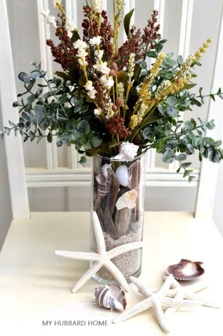 65 Creative Vase filler ideas for home decor - Craftionary Coastal Vase Decor, Vase Decorating Ideas Diy Craft Projects, Tall Clear Vase Filler Ideas, Large Vase Filler Ideas, Round Flower Arrangements, Large Glass Vase Filler Ideas, Clear Vase Decor Ideas, Glass Vases Decor Ideas, Coastal Vase