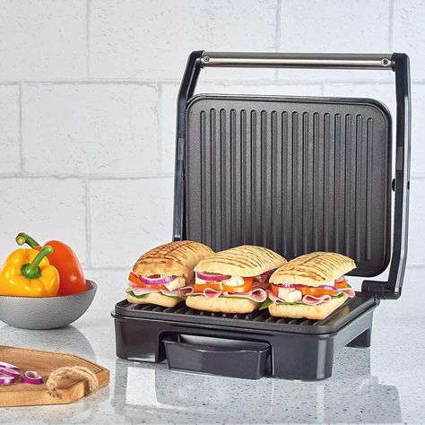 🥪✨ Making the perfect panini with a panini press is easy! 1️⃣ Preheat: Plug in and preheat. 2️⃣ Prepare: Butter or oil the outside of your bread. 3️⃣ Fill: Add your favorite fillings (cheese, ham, veggies). 4️⃣ Press: Place in the panini press and close the lid. 5️⃣ Cook: Cook for 3-5 minutes until golden and melty. 6️⃣ Enjoy: Let cool slightly, then dig in! 📸 Share your panini creations! What's your favorite filling? 🥪✨ #PaniniPress #HomemadePanini #QuickSnacks #QuickSnacks #AndrewJamesToa... Pressed Sandwich, Dip Tray, Panini Press, Indoor Grill, Sandwich Maker, Electric Grill, Drip Tray, Meat Cuts, Slice Of Bread