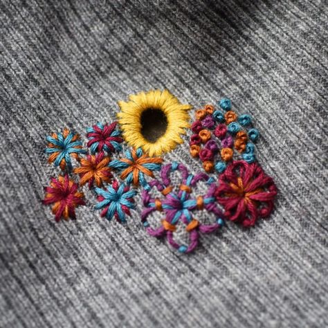 Fixing a holey sweater with embroidery - great visible mending idea from Hunter Hammersen! Visible Mending Stitches, Mending Clothes, Make Do And Mend, Iron On Fabric, Visible Mending, Embroidery Needles, Embroidery Ideas, Satin Stitch, Ribbon Embroidery