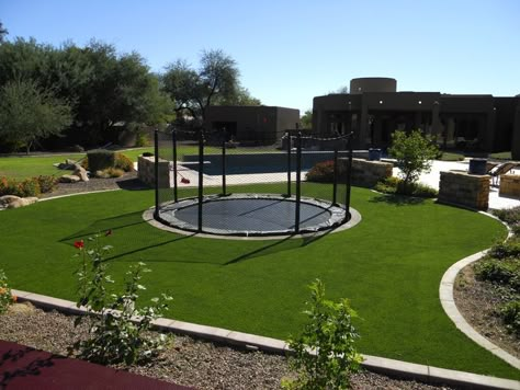 backyard sunken trampoline | Sunken Trampoline in turf with netting | Backyard gym | Pinterest ... Sunken Trampoline, Backyard Gym, In Ground Trampoline, Artificial Grass Installation, Backyard Trampoline, Artificial Plants Indoor, Artificial Plants Outdoor, Backyard Playground, Backyard Play