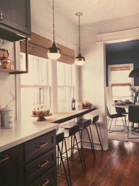 Place a wood counter in front of a window to make use of awkward space. I also like the drop shelf under the counter and brass pulls. Photo from Magnolia Journal 2020 Bar In Front Of Window, Kitchen Window Shelves, Kitchen Window Bar, Breakfast Bar Table, Kitchen Sitting Room, Magnolia Journal, Kitchen Bar Counter, Kitchen Bar Table, Kitchen Desks