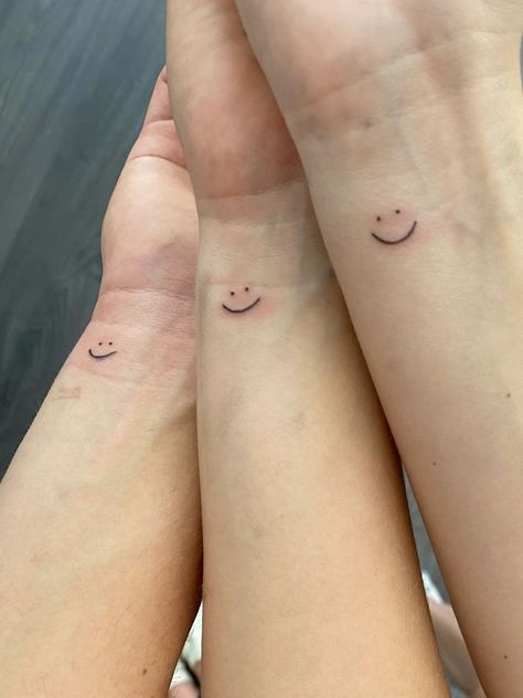 Sibling tattoo :) smiley Tattoos Ideas For 3 Friends, Matching Tattoos For Trio Best Friends, Small Tattoos For 3 Siblings, Simple Tattoos For Siblings, Brother And Sister Tattoo Ideas Small Funny, Small Sibling Tattoos For 4, Tattoos For Four Siblings, 3 Sibling Matching Tattoos, Matching Friend Group Tattoos