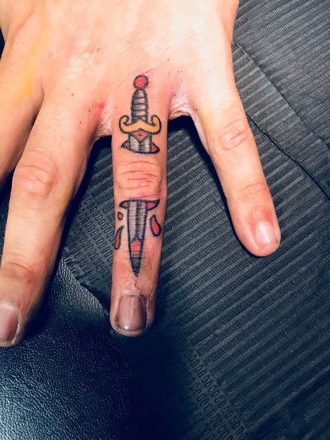 Knife Tattoo On Finger, Traditional Funny Tattoo, American Traditional Tattoos Knife, Finger Knife Tattoo, Knife Hand Tattoo, Knife Finger Tattoo, American Traditional Finger Tattoos, Knife Traditional Tattoo, Traditional Tattoo Knife