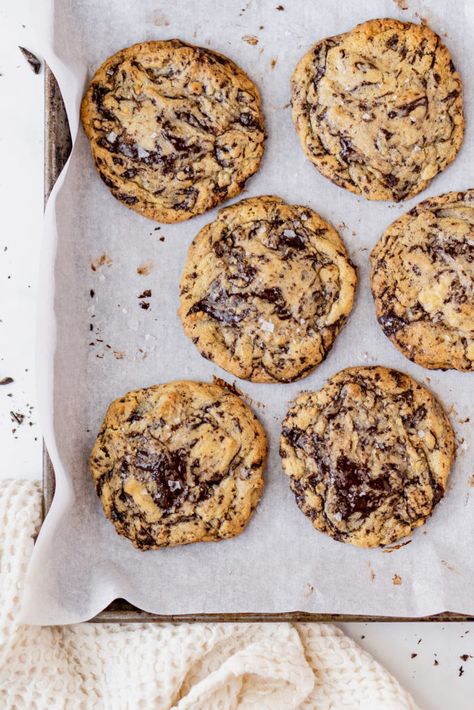 Buttery, chocolate chunk cookies with crisp edges, soft centers filled with melty dark chocolate & a sprinkle of flaky sea salt. Salted Chocolate Chunk Cookies, Salted Cookies, Sea Salt Chocolate, Frozen Cookie Dough, Salted Chocolate, Chocolate Chunk, Chocolate Chunk Cookies, Baking And Pastry, Silicone Baking