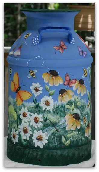 The antique milk can final project is done! Painted Buckets, Painted Trash Cans, Painted Milk Cans, Milk Can Decor, Antique Milk Can, Old Milk Cans, Folk Art Flowers, Spring Painting, Milk Cans