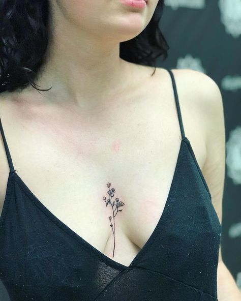 Super small flower piece from the other day. #flowertattoo #wildflowertattoo #instaflowers #flowers #tinytattoo #microtattoo #sternumtattoo… Between Breast Tattoos For Women Simple, Chest Tattoo Flowers, Tattoo Sternum, Black Color Hairstyles, Ma Tattoo, Tattoo Samples, Tiny Tattoos For Women, Small Chest Tattoos, Color Hairstyles