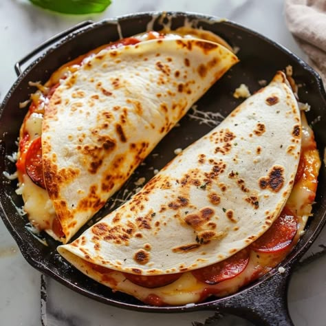 Easy Pizza Quesadilla Is the Ultimate Cheesy Mashup Pepperoni Quesadilla, Quesadilla Pizza, Quesadilla Maker Recipes, Dessert Quesadilla, Mexican Quesadilla, Pizza Quesadillas, Food Polls, Pizza Quesadilla, Tortilla Recipes