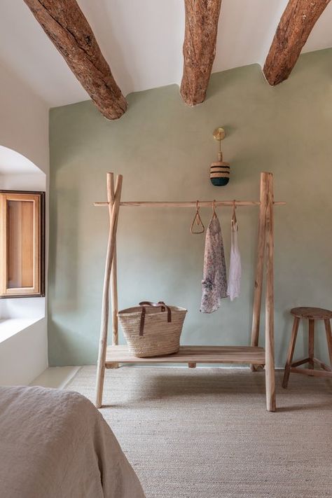 espanyolet — A Historic Catalan Farmhouse Green Limewash Wall, Green Limewash, Limewash Wall, Mallorca House, Wood Clothing Rack, Limewash Walls, Wood Clothing, Built In Sofa, Inspiring Interiors