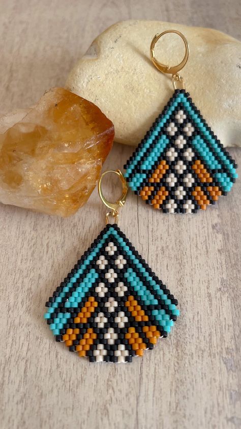 This listing is for a digital pattern of my original diamond brick stitch beaded earring pattern called Harvest Moon. Your purchase does NOT include instructions or supplies, but you can find tutorials for Brick Stitch on ton my YouTube channel, https://www.youtube.com/@snailsandfairydust The finished size of one earring is 1.25 x 1.5 inches, and this pattern was designed for size 11 Miyuki Delica seed beads, which is what I recommend for best results. However, if you use different beads, please note that the sizing will vary. With your purchase, you will receive a 3 Page PDF with a visual beading chart, a word chart, supply list and the exact bead count needed as well as the product numbers for the specific size 11 Delica beads used in the design. I can't wait to see what you create. Happ Brick Stitch Earrings Tutorial Free Pattern, Seed Bead Jewelry Patterns Tutorials, Genie Jewelry, Seed Bead Patterns Free Earrings, Bead Stitching Patterns, Delica Beaded Earrings, Beading Earring, Brick Stitch Beading, Brick Stitch Pattern Earring