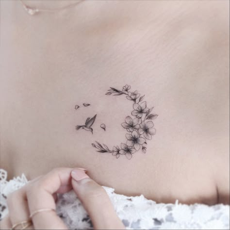 Cherry blossom tattoo by Tattooist Greem #TattooistGreem #cherryblossomtattoos #cherryblossom #flowers #floral #nature #plant #cherryblossomtattoo #illustrative #linework #fineline #hummingbird #chesttattoo #small | Sep 19th 2019 | 1180281 Foot Tattoos For Women, Tattoos For Women Flowers, Moon Tattoo Designs, Tiny Tattoo, Blossom Tattoo, Cherry Blossom Tattoo, Hummingbird Tattoo, Shoulder Tattoos For Women, Collar Bone Tattoo