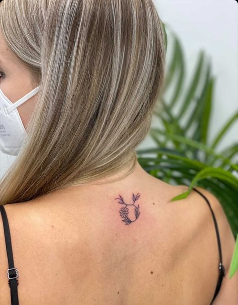 Daisy Taurus Tattoo, Taurus Neck Tattoo, Women Taurus Tattoo, Minimalist Tattoo Taurus, Taurus Line Tattoo, Taurus Inspired Tattoos, Taurus Fine Line Tattoo, Symbol Back Tattoo, Taurus Tattoo For Women Zodiac