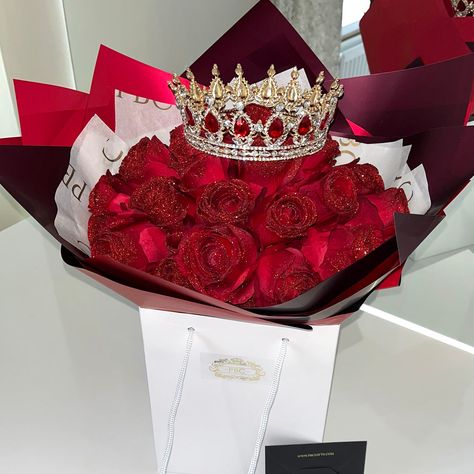 If you're looking for an extravagant gift that will leave everyone in awe, our 'Enchanted Glitter Rose' gift set is perfect for you. This set includes 25 luxurious roses draped in sparkling glitter, creating a mesmerising and shimmering effect. And to top it off, it comes with a sparkling tiara that will make the receiver feel like an ultimate queen. Bouquet Content - 25x Artificial Glitter Roses, 1x Flower Gift Bag (Flower Paper & Ribbon Included), 1x Tiara (Alloy - Adult Head Size 12 x 12 x 5c Colourful Rose Bouquet, Forever Roses Bouquet, Glitter Flower Bouquet, Glitter Roses Bouquet, Luxury Flowers Roses, Glitter Bouquet, Ribbon Rose Bouquets, Roses Bouquet Gift, Luxury Bouquet