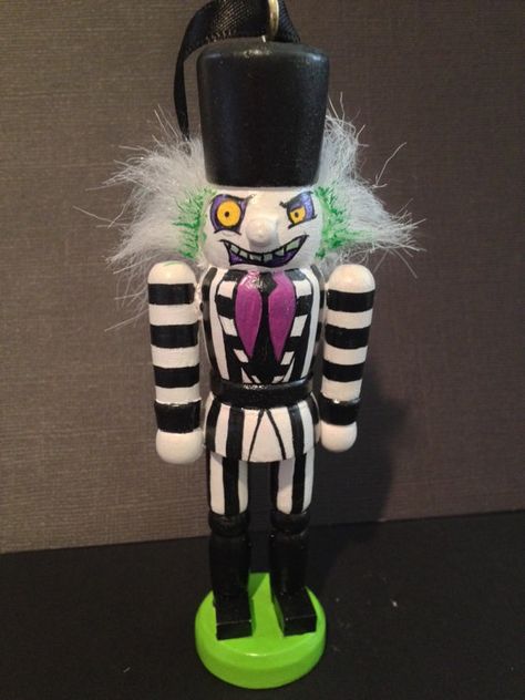 Beetlejuice nutcracker Halloween Nutcrackers Diy, Goth Nutcracker, Painted Nutcracker Ideas, Grinch Nutcracker, Funny Nutcracker, Painted Nutcracker, Diy Nutcracker, Nutcracker Ideas, Nutcracker Collection