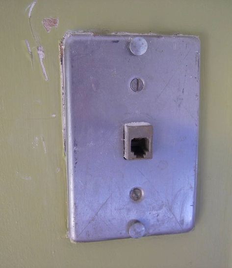 I used to have a wall phone in the kitchen. The metal plate is still there and as you see in the photo, it's unsightly. | Hometalk How To Cover Outlets On Wall, Cover Outlets On Wall, Hide Phone Jack, Diy Outlet Covers, Plate Covers Diy, Phone Jack Covers, Hide Outlet, Wall Outlet Covers, Wall Jack