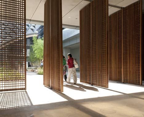 pivoting screens sleek natural wood delicate detailed Masdar City, Pacific Green, Interior Design Institute, Future Buildings, Foster Partners, Pivot Doors, Contract Furniture, Traditional Architecture, Interior Barn Doors