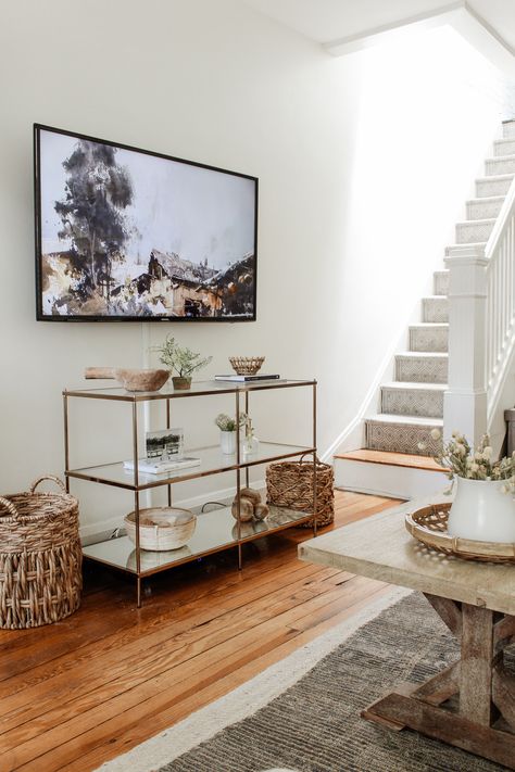 Tv Over Console Table, Under The Tv Decor, Under Tv Decor, Decor Under Tv, Staircase White, Tv Console Decorating, Tv Console Decor, Farmhouse Staircase, Decor Around Tv