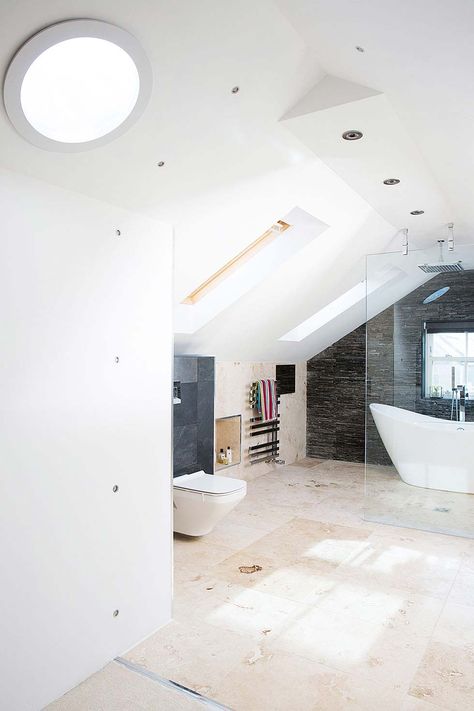 open-plan en-suite bathroom in a loft conversion Loft Conversion Bedroom Ensuite, Shower In Eaves, Upstairs Loft Bedroom Master Suite, Loft Conversion Bedroom With Ensuite, Loft Master Suite, Loft Conversion Bedroom Master Suite, Open Plan Bedroom And Bathroom, Open Plan Bathrooms, Loft Conversion Bedroom