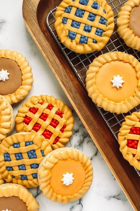 Transform your Thanksgiving dessert table into a mini-pie paradise with our Decorated Thanksgiving Mini Pie Sugar Cookies! 🥧🍪 Elevate your holiday spread with these adorable, edible works of art that capture the essence of the season. Our step-by-step tutorial guides you through creating these charming cookies, perfect for adding a sweet touch to your festivities or as delightful edible gifts. Embrace the spirit of gratitude with every bite! 🍂🍁 #CookieArt Mini Thanksgiving Cookies, Pie Sugar Cookies Decorated, Thanksgiving Cutout Cookies, Pie Decorated Cookies, Thanksgiving Cookies Decorated Easy, Pie Cookies Decorated, Thanksgiving Royal Icing Cookies, Thanksgiving Sugar Cookies Decorated, Sugar Cookie Pie