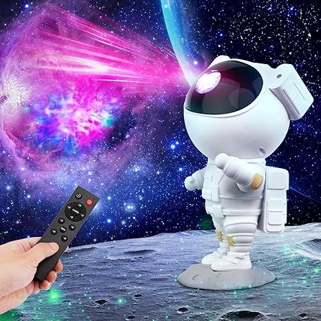 [Cool Astronaut Star Projector] Star light projector night light features 8 stunning nebula effects accompanied by twinkling green stars. Whether you project it onto the walls or ceiling, it will immerse you in the beauty of the galaxy. This versatile starlight will add color to your night sky and take your gaming experience to the next level. Ceiling Projector, Star Projector Light, Childrens Night Light, Galaxy Lights, Star Night Light, Houzz Decor, Night Light Projector, Star Projector, Pretty Bedroom