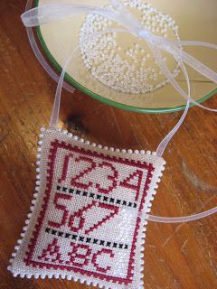 I've been receiving lots of questions about my ornament edgings, so here's how I do them.   Backstitch matching fronts and backs. I always d... Edging Embroidery, Edge Tutorial, Finishing Cross Stitch, Embroidered Projects, Picot Stitch, Cross Stitch Pillows, Beaded Edging, Stitch Artwork, Cross Stitch Gifts