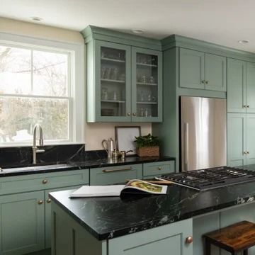 75 Kitchen with Green Cabinets and Black Countertops Ideas You'll Love - September, 2024 | Houzz Black Countertop Kitchens, Soapstone Countertops Kitchen, Traditional Kitchen Remodel, Black Kitchen Countertops, Black Countertop, Ideas For Storage, Recessed Panel Cabinets, Black Backsplash, White Tile Backsplash