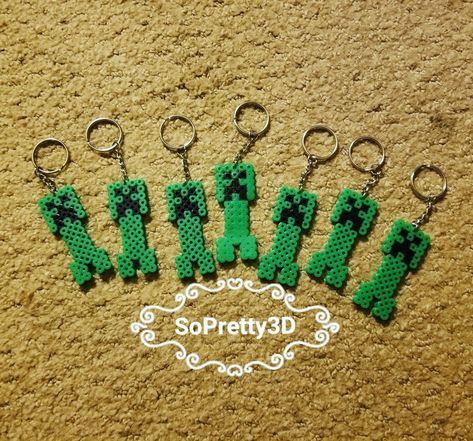 Minecraft creeper perler bead keychains Perler Bead Creeper, Creeper Perler Bead Pattern, Minecraft Melty Beads, Creeper Perler Beads, Perler Keychain Ideas, Simple Perler Bead Patterns, Minecraft Perler Bead Patterns, Perler Beads Keychain, Perler Keychain