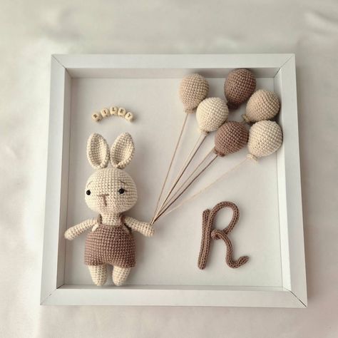 "Handmade cute bunny Riley is ready, with natural-toned balloons! 🐰🎈 Perfect as a newborn gift. 🌟 #crochet #amigurumi #newborn #babygift #tricotin Personalized Baby Frame, Baby Gift Crochet, Nursery Frames, Personalized Nursery Decor, Baby Keepsake Box, Bunny Nursery, Deep Frame, Amigurumi Bunny, Baby Frame