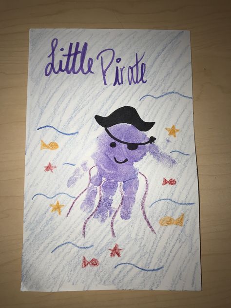 Little Pirate Craft for Pirate week at a daycare! #pirate #oceanlife #handprint #craft #purple #octopus #preschool #babies #daycare #pirateweek Purple Handprint Crafts, Pirate Craft For Toddler, Pirate Handprint Craft, Pirate Crafts For Infants, Mermaid And Pirate Crafts For Toddlers, Infant Pirate Crafts, Pirate Footprint Art, Pirates Crafts For Toddlers, Letter P Handprint Craft