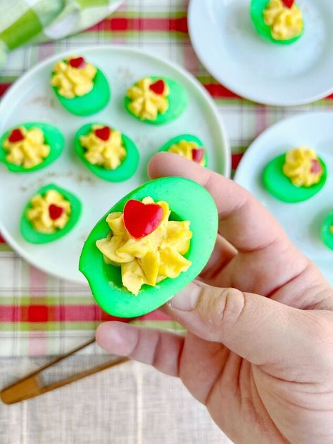 Today, we’re making Grinch Eggs! These are simply deviled eggs with a little holiday magic. We’re going to take some hard boiled eggs, dye them green, fill them with a savory filling kissed with Old Bay, then finish them off with a little red bell pepper heart. Cocoa Dip Recipe, Hot Cocoa Dip, Cocoa Dip, Winter Pasta, Grinch Party, Stuffed Mini Peppers, Fondant Stamping, Old Bay, Green Food Coloring