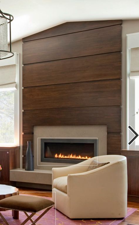 Modern Oak Fireplace Surround, Wood Slats Around Fireplace, Modern Fireplace With Floating Shelves, Wood Veneer Fireplace Wall, Cozy Modern Fireplace, Walnut Fireplace Surround, Wood Fireplace Wall Ideas, Midcentury Modern Fireplace Wall, Modern Fireplace With Mantle