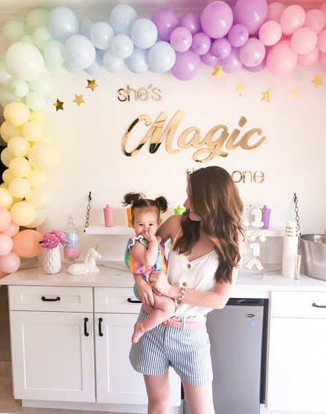 Rainbow First Birthday Party Ideas | Celebration Stylist | Popular Party Planning Blog 1st Birthday Party Ideas Rainbow, Shes Magic That One First Birthday, Simple First Birthday Party Ideas, Magical One First Birthday, One Magical Year Birthday, Rainbow Themed First Birthday Party, Magical One Birthday Party, Rainbow First Birthday Party Girl, First Birthday Rainbow Theme