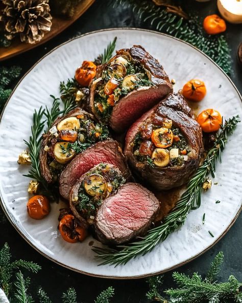 This Christmas Stuffed Beef Tenderloin combines a perfectly roasted tenderloin with a savory stuffing made from garlic, onions, and fresh herbs. The tenderloin remains juicy and tender while the stuffing ... Read more Stuffed Tenderloin Recipes, Stuffed Beef Tenderloin Recipes Oven, Beef Tenderloin Christmas Dinner, Stuffed Tenderloin Beef, Crockpot Beef Tenderloin, Christmas Tenderloin, Stuffed Beef Tenderloin Recipes, Christmas Beef Tenderloin, Christmas Steak