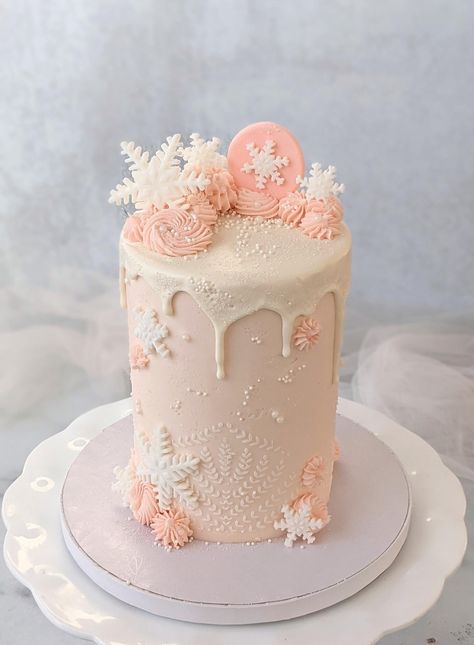 Winter Wonderland Pink Cake, Pink And White Snowflake Cake, First Birthday Cake Winter, Winter Baby Shower Cakes Girl, Winter Smash Cake Girl, It’s Cold Outside Baby Shower Cake, Winter Onederland Cake Girl, Winter Onederland Party Girl Cake, First Birthday Girl Winter