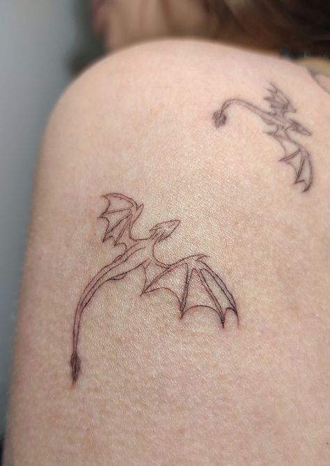 #tattoo #dragons #tattooforwoman Inst: A.Berger_tattoo Multiple Dragon Tattoo, Simple Wyvern Tattoo, Dragon Stick And Poke, Tairn And Andarna Tattoo, Dainty Dragon Tattoo For Women, Inkbox Tattoo Ideas, Tiny Dragon Drawing, Abstract Fine Line Tattoo, Abraxos Wyvern Tattoo