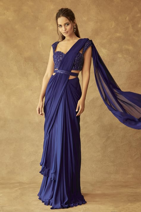 Luxury Blue Pre-draped Saree With Chikankari Embroidery, Luxury Bollywood Pre-draped Saree For Summer, Luxury Blue Churidar With Traditional Drape, Luxury Blue Blouse For Reception, Luxury Designer Wear Multicolor Pre-draped Saree, Luxury Purple Chanderi Pre-draped Saree, Luxury Royal Blue Traditional Wear With Drape, Luxury Georgette Pre-draped Saree With Intricate Embroidery, Luxury Pre-draped Saree With Dori Work For Celebration