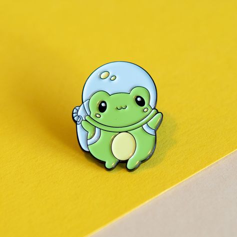 🚀🐸 Blast off with our adorable Astronaut Frog Pin! Perfect for space enthusiasts and frog lovers alike. Leap into your next adventure with style! 🌌🌠 #SpaceFrog #CutePins #NeatPins Tiny Astronaut, Space Frog, Frog Dress, Frog Pin, Astronaut Helmet, Frog Theme, Cute Astronaut, Frog Pins, Cute Frogs