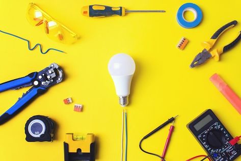 Set of electrician's tools on yellow bac... | Premium Photo #Freepik #photo #electrical-tools #electrician-tools #multimeter #electrical-services