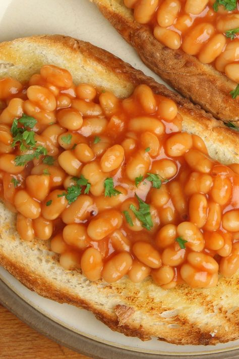 Baked Beans on Toast is a traditional British favorite that’s incredibly easy to make and satisfying to eat. Keep a few cans of baked beans on hand to enjoy beans and toast whenever the craving arises. Baked Navy Beans Recipe, Baked Beans From Canned Navy Beans, Baked Beans And Rice, Canned Navy Bean Recipes, White Navy Bean Recipes, Recipes With Navy Beans, Navy Beans Recipe, British Baked Beans, Eat More Beans