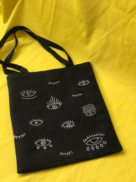 Black Bag Embroidery, Black Tote Bag Embroidery, Black Tote Bag Design Ideas, Evil Eye Bag, Doodle Canvas, Embroidery Business, Minimal Bags, Totes Ideas, Organic Bag