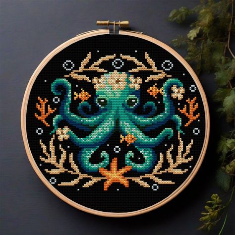 Under the sea, under the sea... under the sea such a beautiful octopus decorated with a wreath of flowers, gracefully surrounded by colorful fish, swaying seaweed and bright ocean flora. 🌸🐙🐠🌿 #tourmalinepattern #crossstitchpattern #crossstitch #embroidery #floralcrossstitch #cozyplace #summervibes #summerembroidery #garden #springembroidery #xstitch #xstitchpattern #funnycrossstitch #funnyembroidery #octopus #sea #ocean #seapattern #cottagecore #OceanMagic #UnderwaterWonder #OctopusElega... Underwater Embroidery, Octopus Cross Stitch, Cottagecore Cross Stitch, Creepy Cross Stitch, Floral Octopus, Marine Embroidery, Ocean Embroidery, Witch Cross Stitch Pattern, Cross Stitch Mini