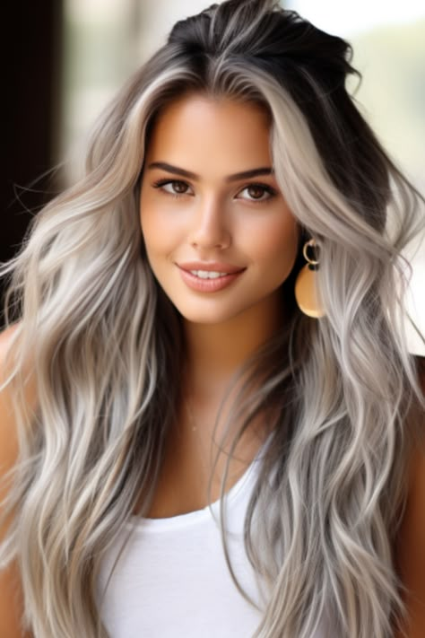 The half-up half-down silver style offers a versatile look that can be casual or elegant. This style pulls half the hair up into a bun or ponytail, allowing the rest to flow freely and showcasing your beautiful silver tones. Click here to check out more stunning silver hair color ideas for 2023. Best Hair For Cool Skin Tone, Silver Hair Color Ideas For Brunettes, Hair Colors For Green Eyes And Fair Skin, Morena Skin Hair Color, Asian Silver Hair, Blonde Grey Balayage, Silver Toned Blonde Hair, Gray Money Piece Hair, Balayage Grey Hair