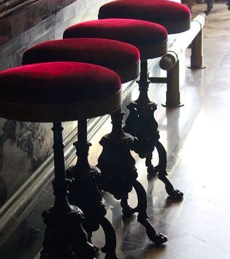 Red velvet bar stools Steampunk Furniture Decor Ideas, Chequered Floor, Steampunk Bar, Red Bar Stools, Steampunk Furniture, Laduree Paris, Eye Photo, Zsazsa Bellagio, Velvet Stool